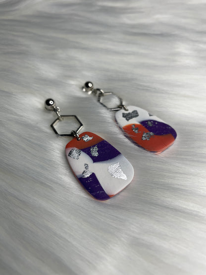 Orange, purple, and white patchwork dangles