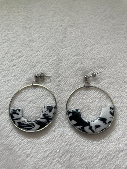 Black and white circle hoop dangles