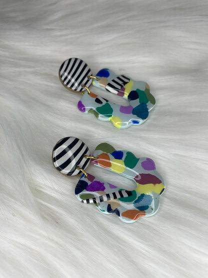 Multi-patterned scalloped dangles