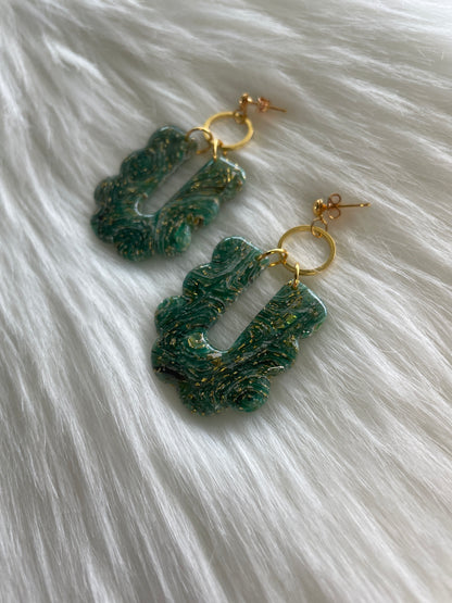 Green stained glass dangles