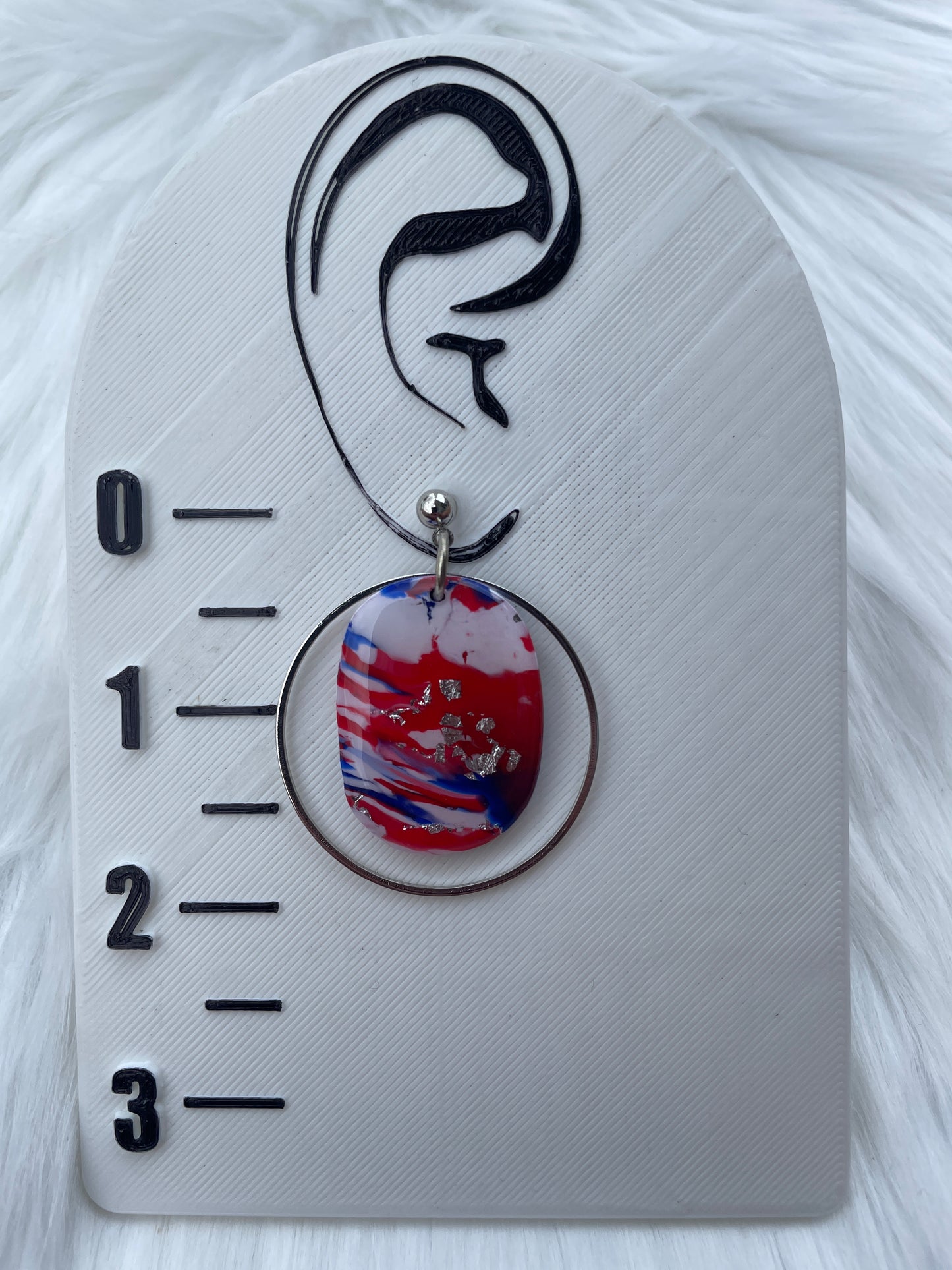 Red, white, and blue oval dangles