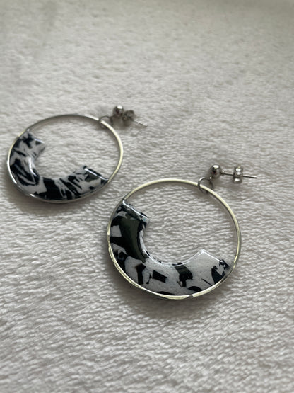 Black and white circle hoop dangles