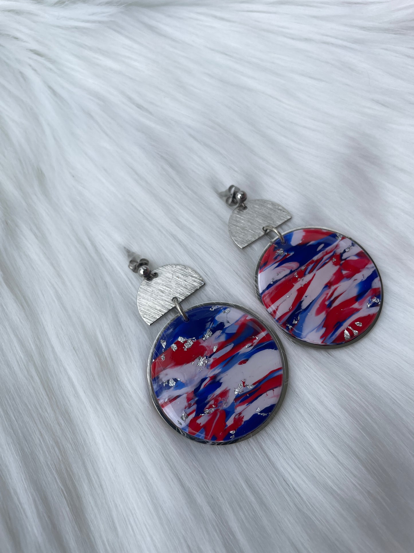 Red, white, and blue round dangles