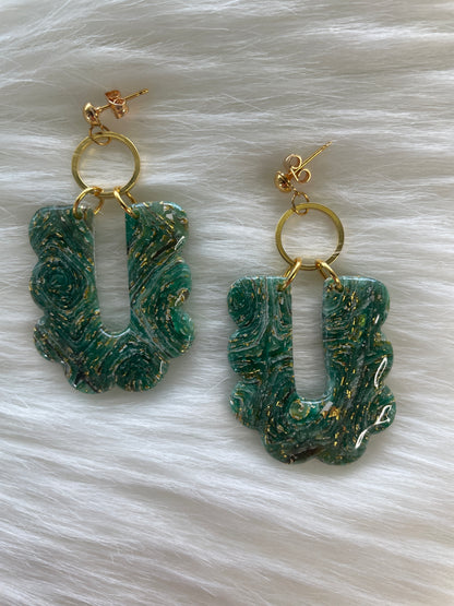 Green stained glass dangles