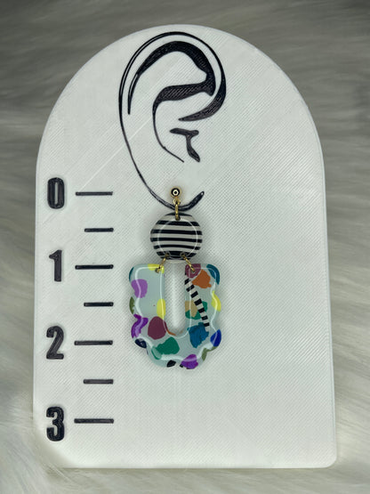 Multi-patterned scalloped dangles