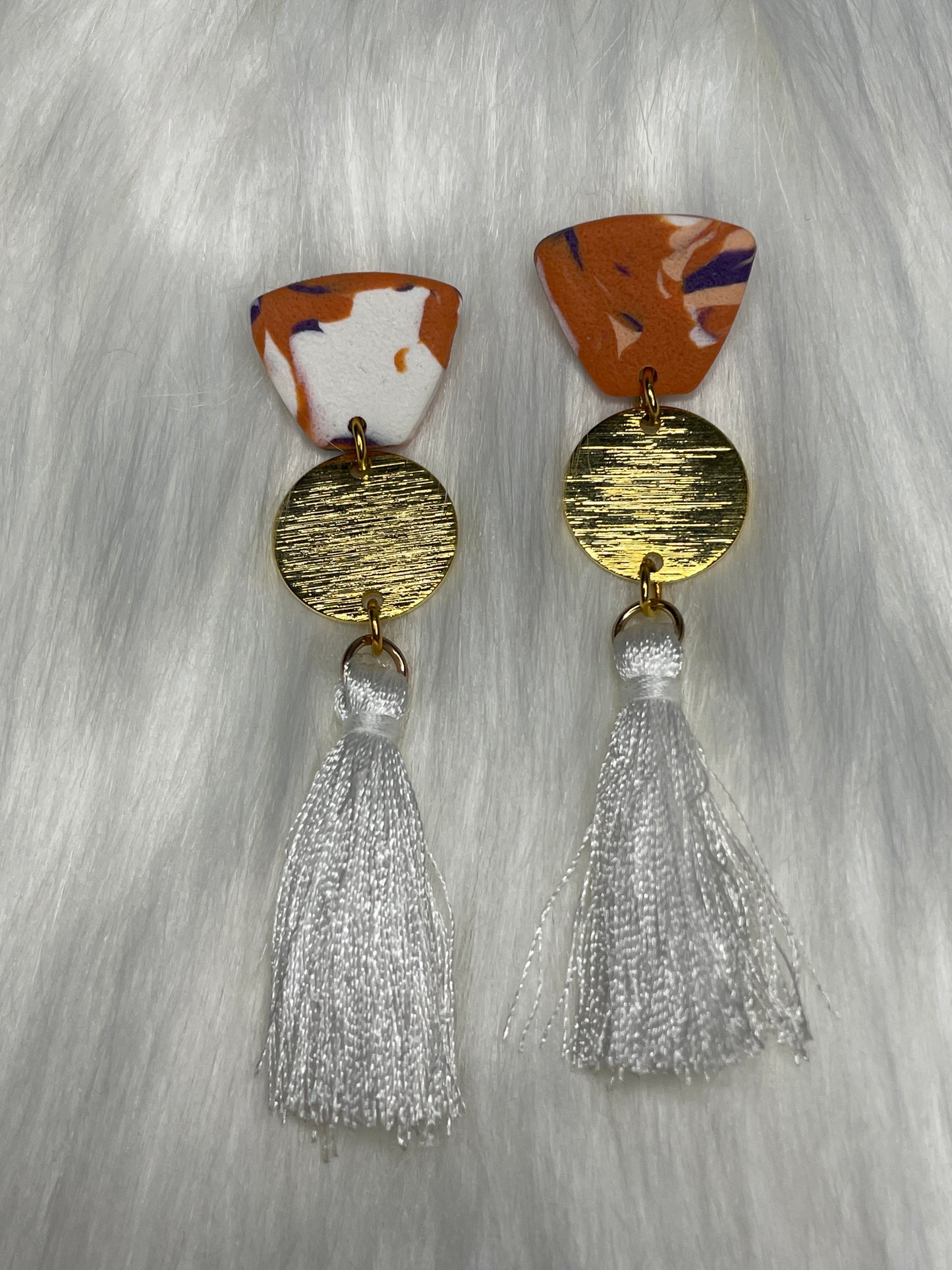 Orange, purple, and white dangles with tassel