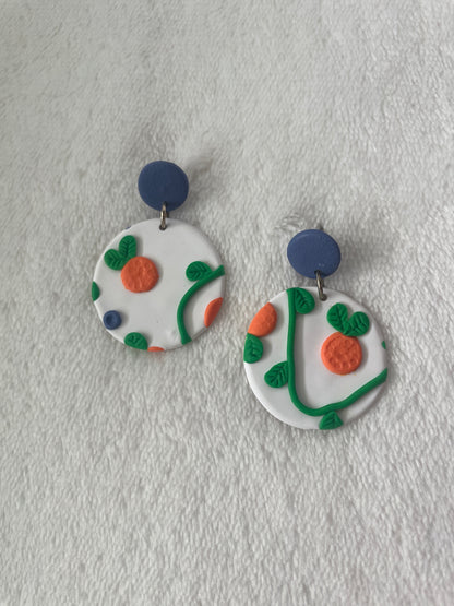 Round dangles with oranges