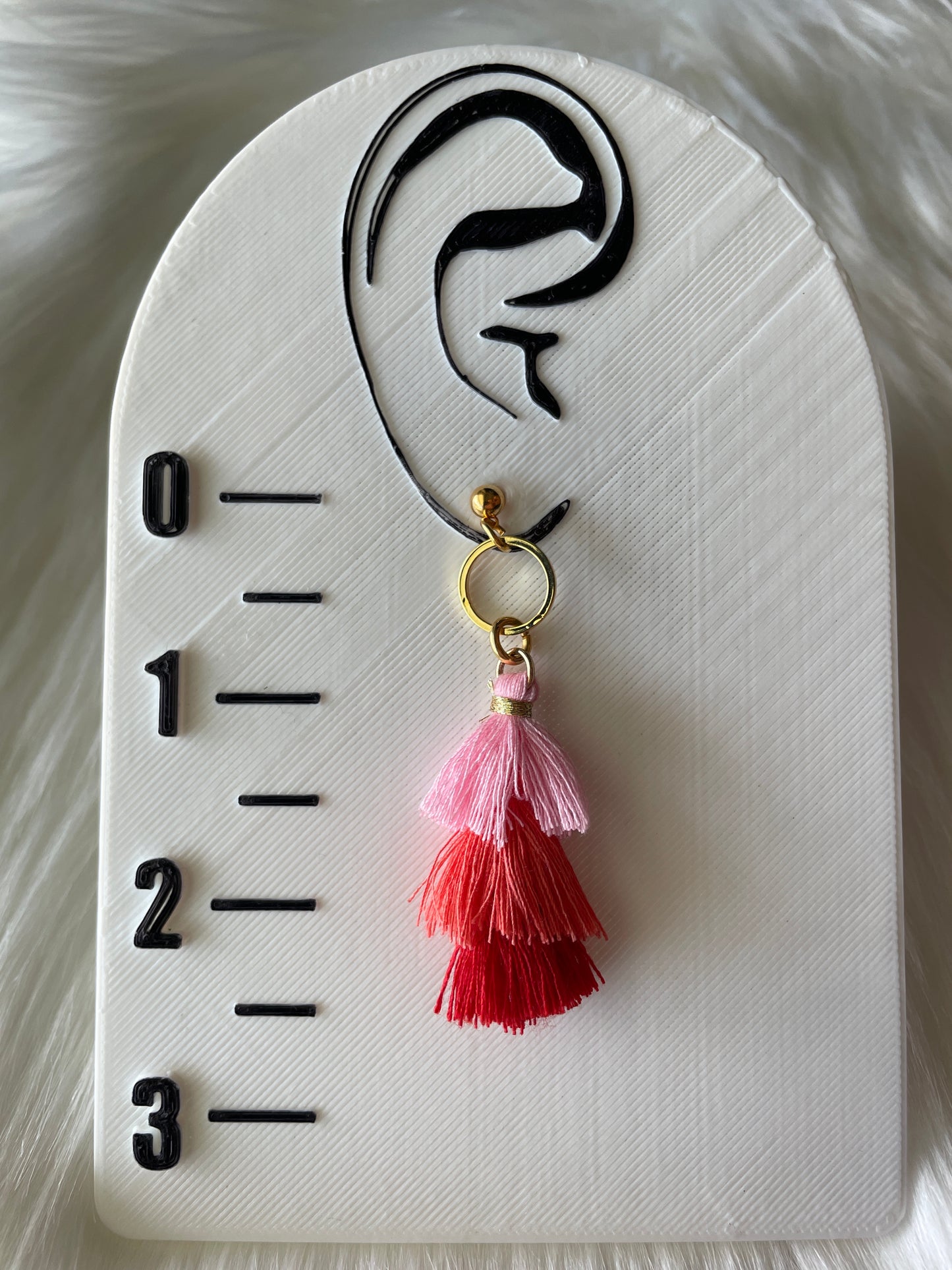 Three-tiered tassel dangles