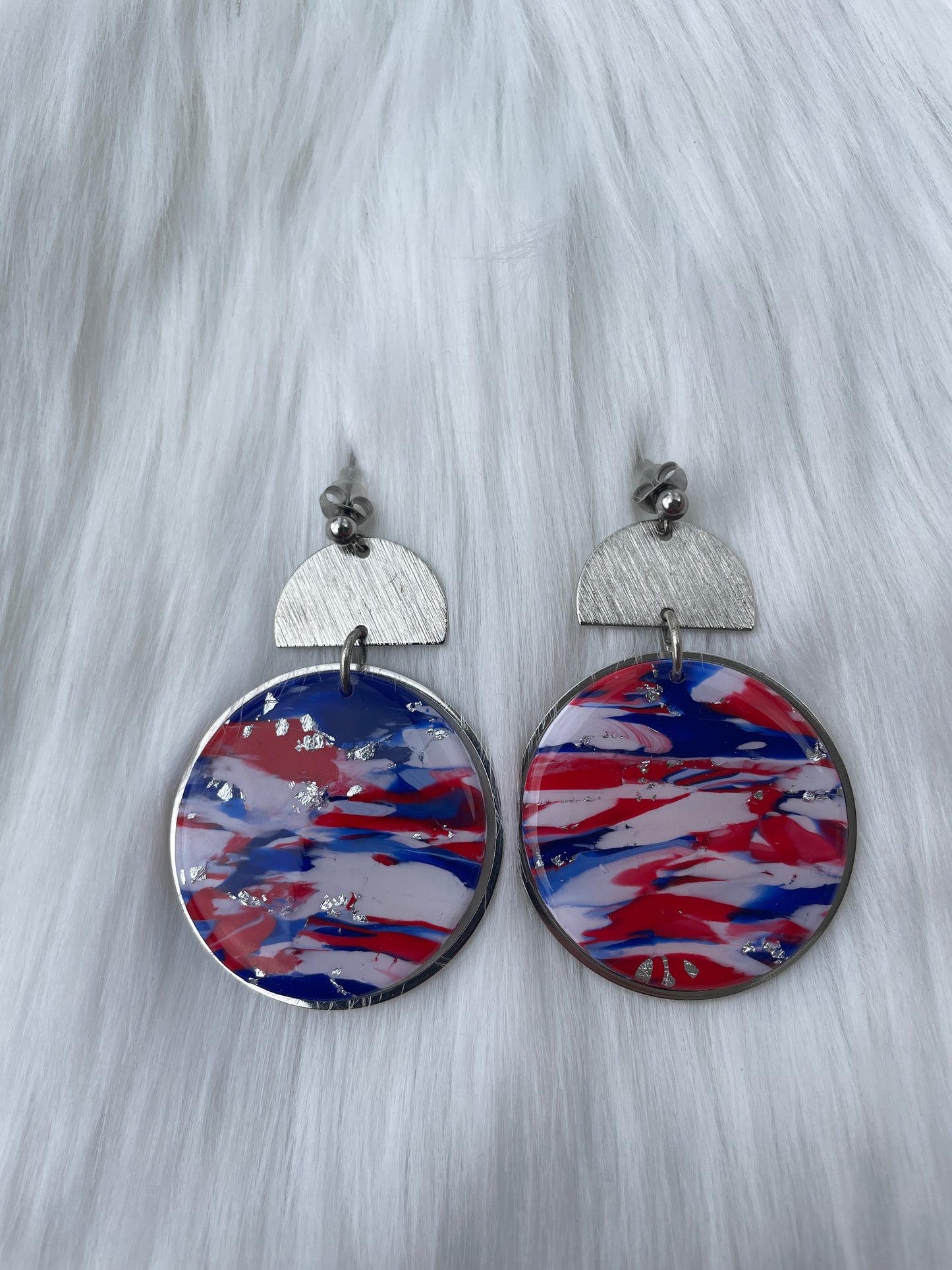 Red, white, and blue round dangles