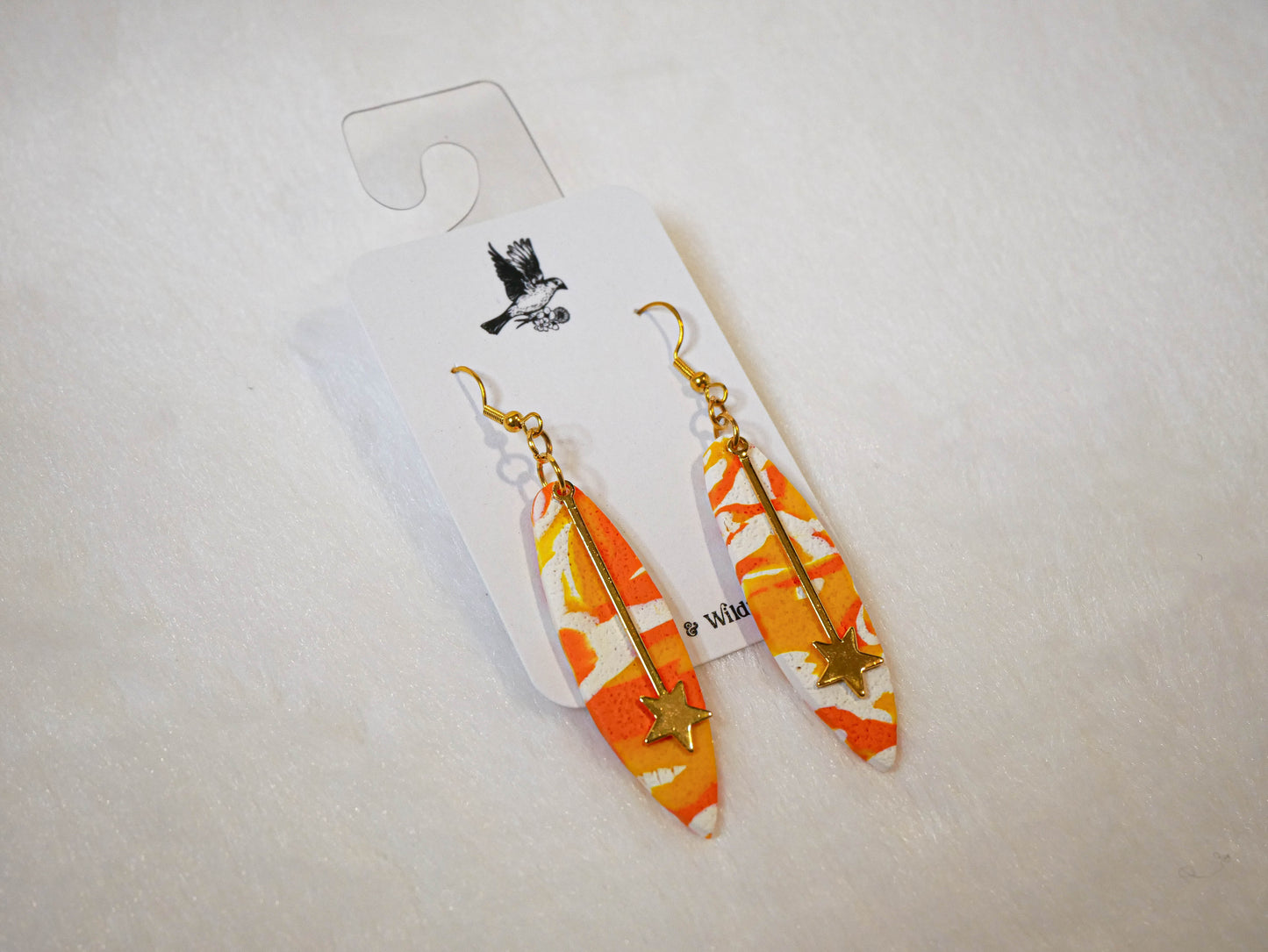 White, Yellow, & Orange Dangles with star