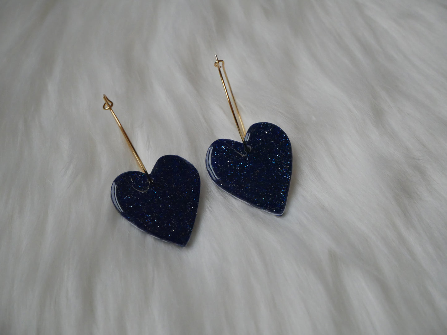 Double sided heart hoop dangles